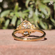 Oval Moissanite Beauty | Filigree Halo Ring | Bezel Set Diamonds