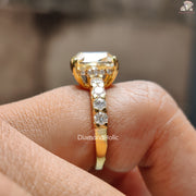 Diamond Holic Cushion Cut Moissanite Wedding Ring with gold band and side diamonds