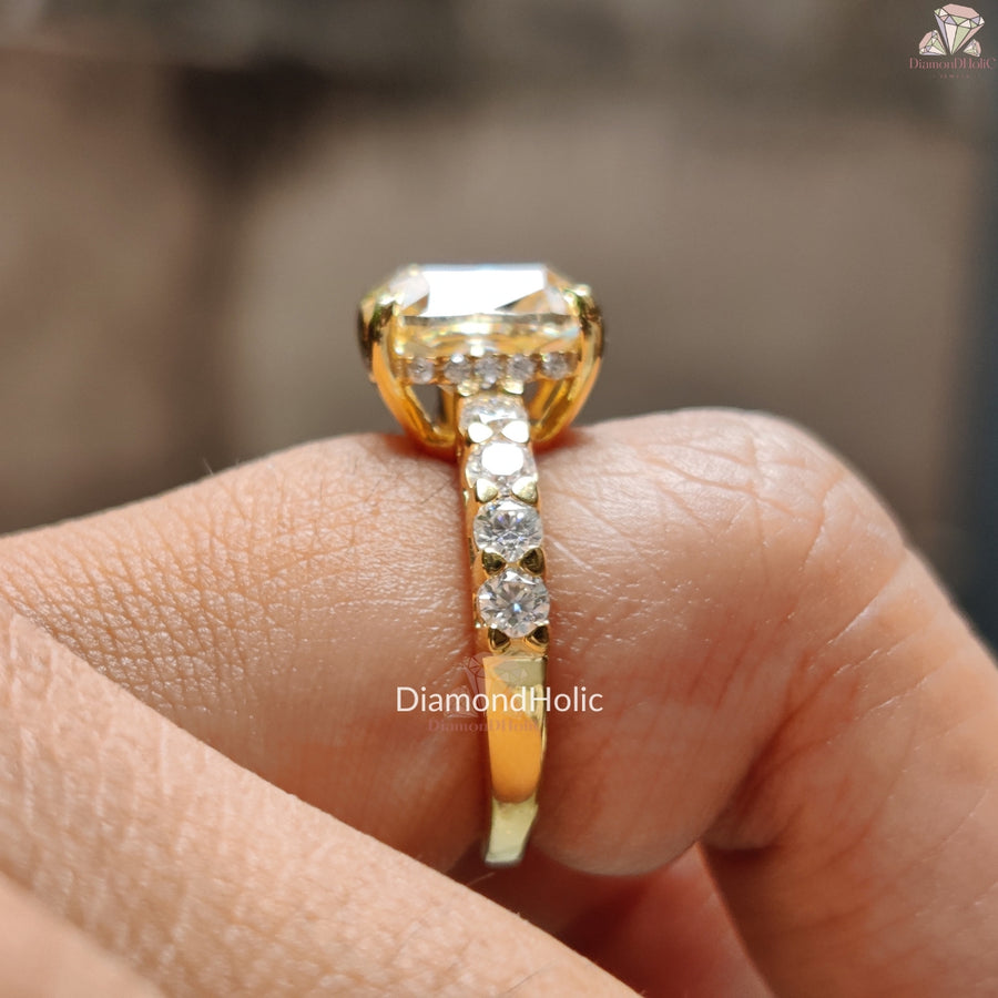 Diamond Holic Cushion Cut Moissanite Wedding Ring with gold band and side diamonds