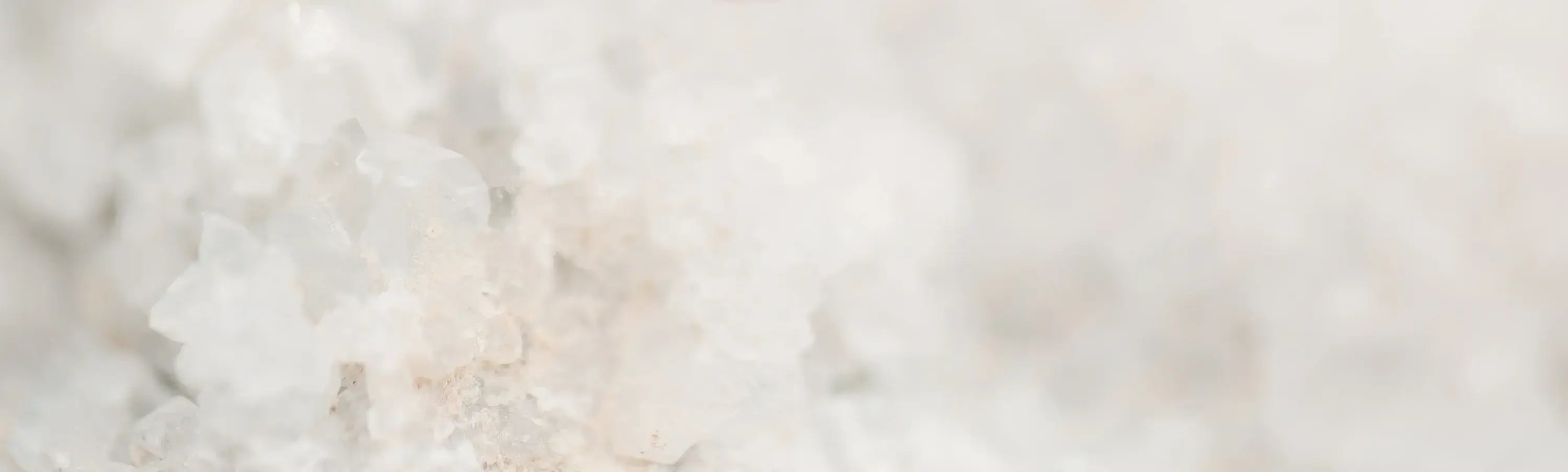 Close-up of a marble surface with a light gray and beige pattern