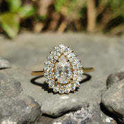 pear halo design | radiant moissanite sparkles | elegant moissanite jewel
