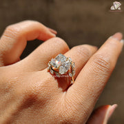 gold 3 stone diamond ring | radiant and marquise cut | gold nature band
