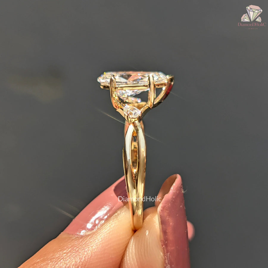 pear side stone | pear shaped ring 