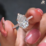 Dainty pear engagement ring