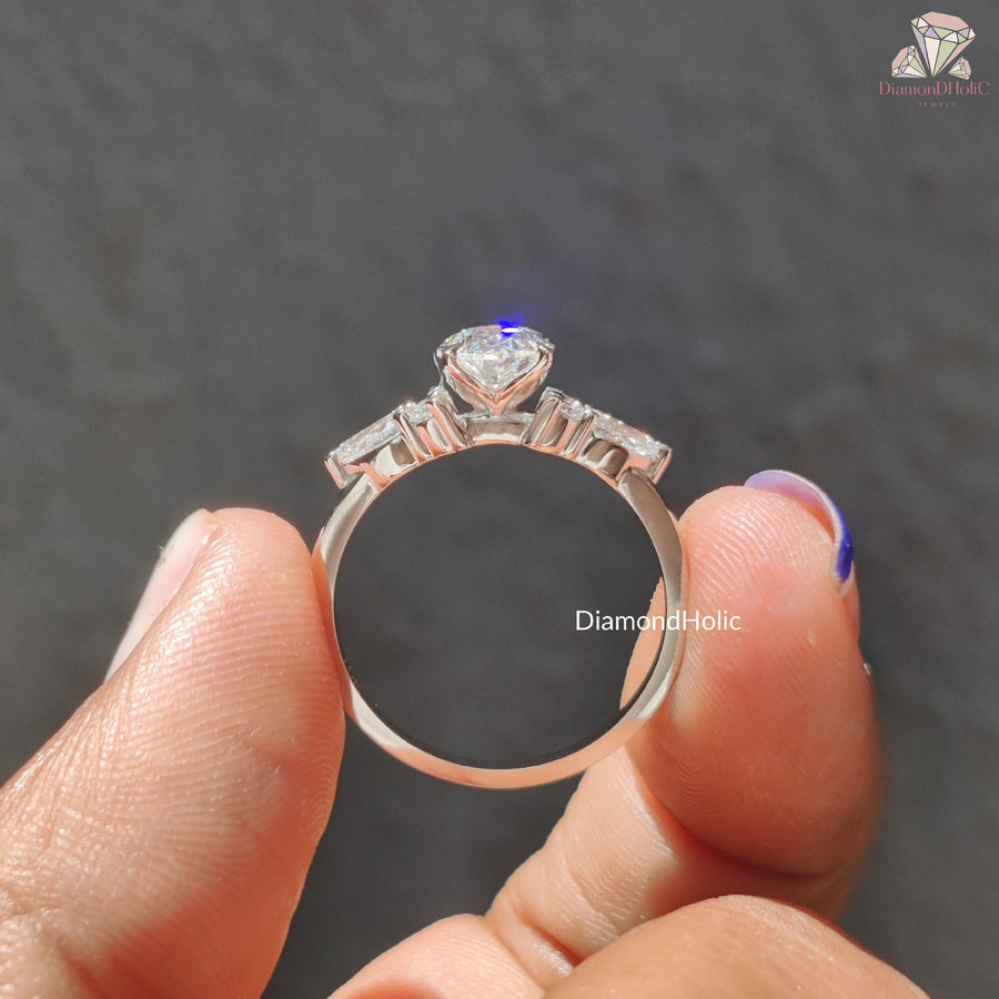 oval cut solitaire | fancy diamond ring | white gold engagement piece
