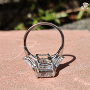 Symbol of Her Story | Triangle Diamond Side | Emerald Moissanite Ring

