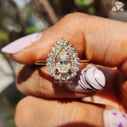 halo moissanite ring | moissanite bridal ring | gold pear ring
