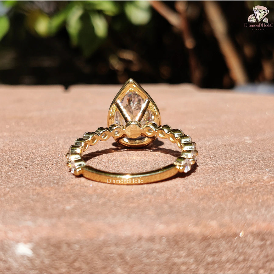 hidden halo pear ring | gold moissanite jewelry | bridal pear cut ring

