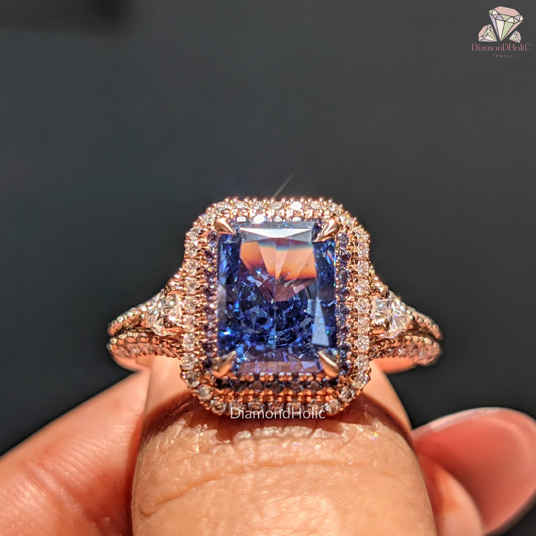 blue CZ halo ring