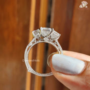 moissanite engagement ring with side stones