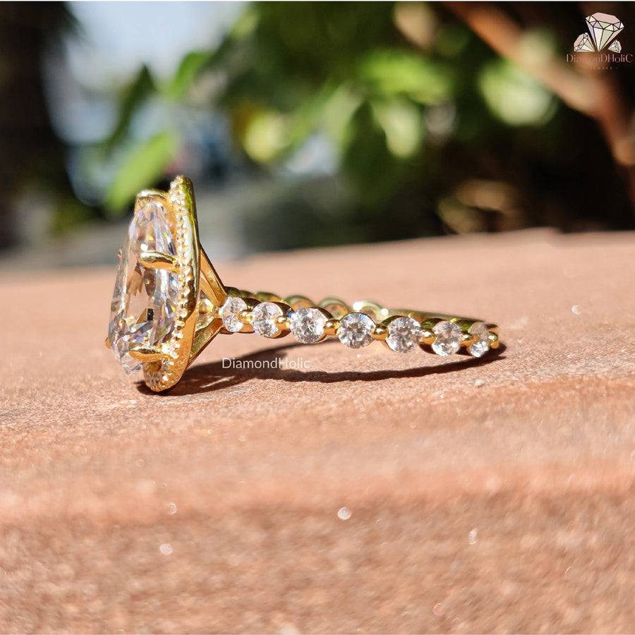 big pear moissanite ring | moissanite gold band | oval pear ring design
