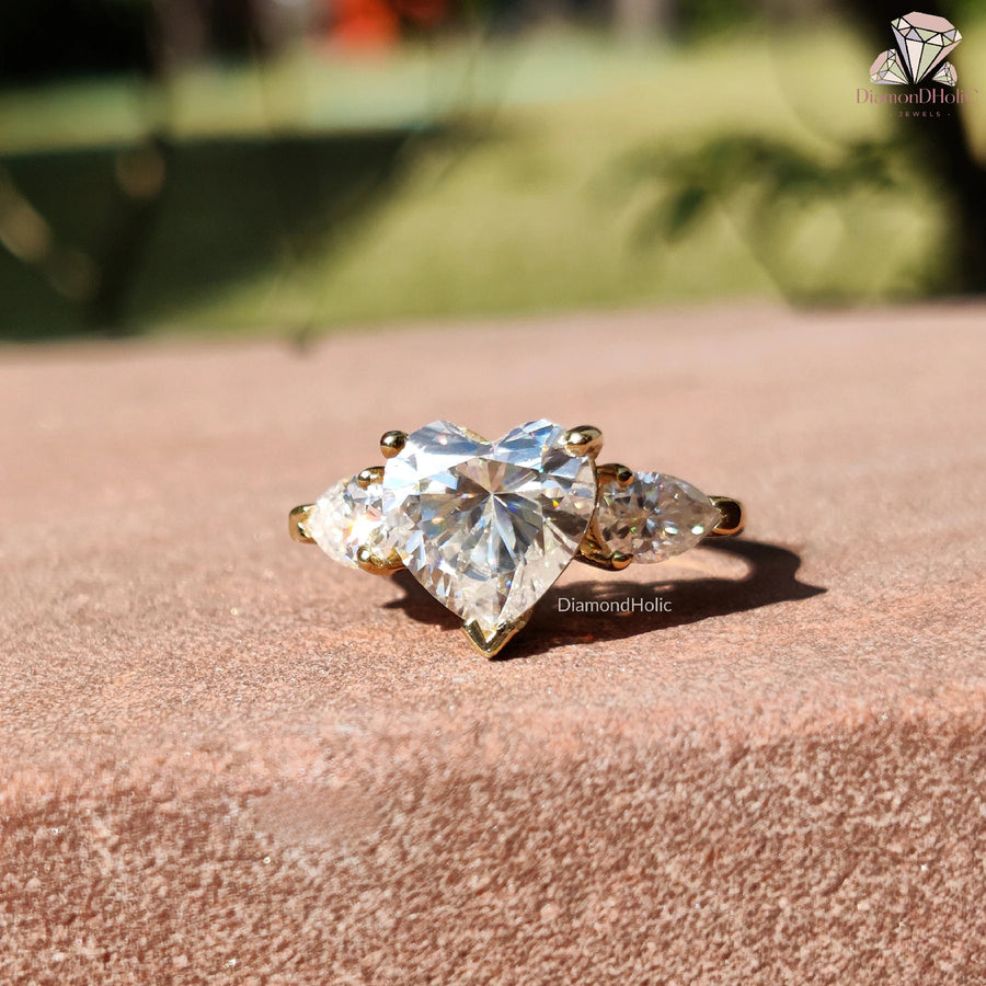 moissanite heart center | three stone moissanite ring | custom heart ring
