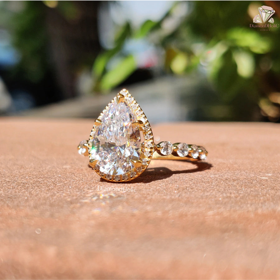 bold center stone ring | moissanite diamond look ring | pear ring with accents
