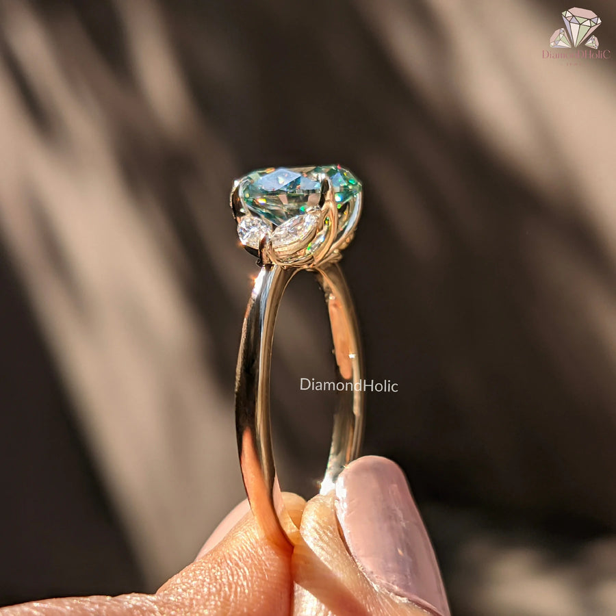 yellow gold moissanite ring | custom moissanite jewelry | pear cut side stones
