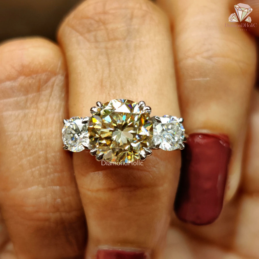 Three stone moissanite ring
