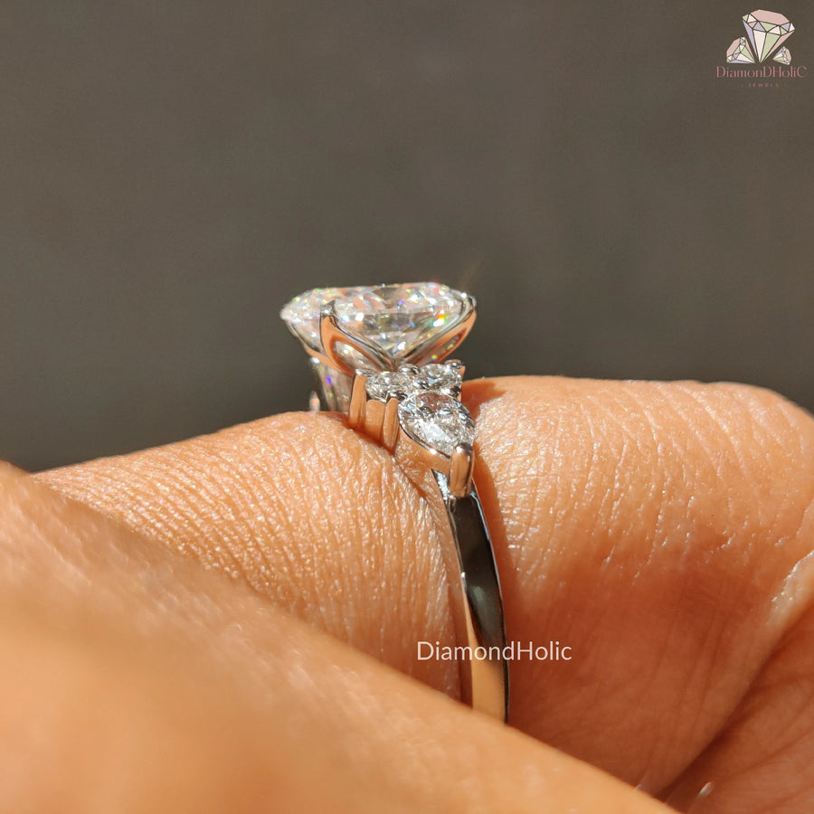 oval engagement ring | pear diamond accents | lab diamond jewelry
