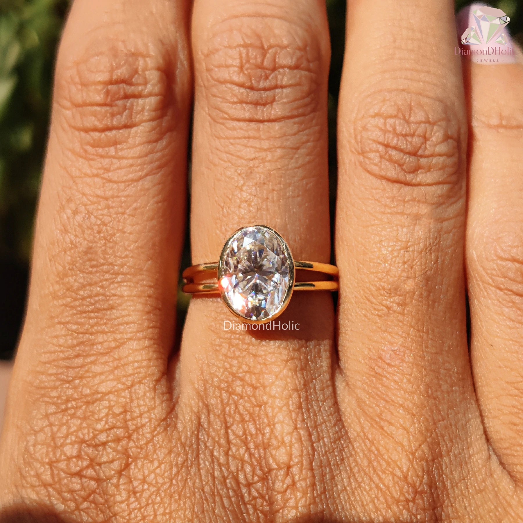 oval moissanite ring | bezel set engagement ring | yellow gold ring
