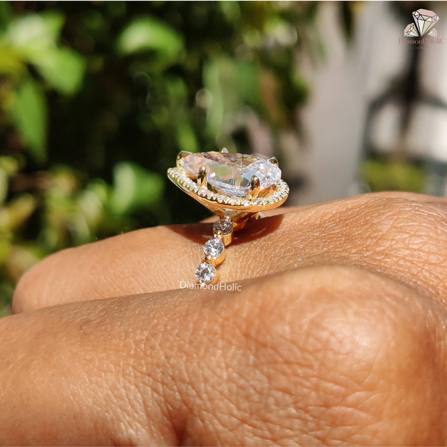 pear solitaire engagement | dazzling halo moissanite | pear teardrop design
