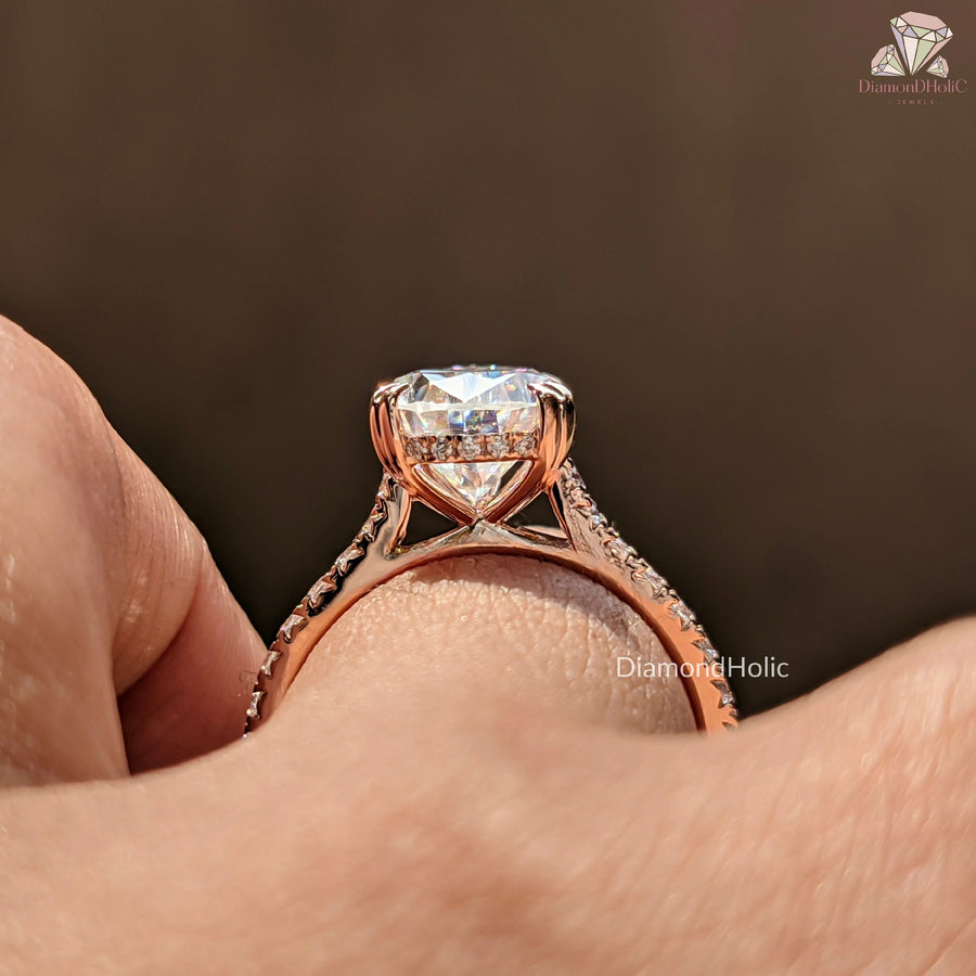 Hidden halo pear ring