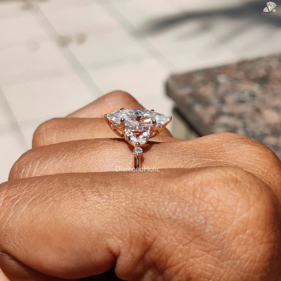 Marquise Cut Ring With Side Marquise and Round Diamonds