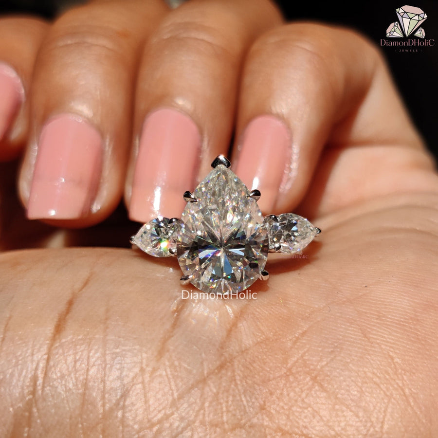 Pear Cut Three Stone Engagement Ring
