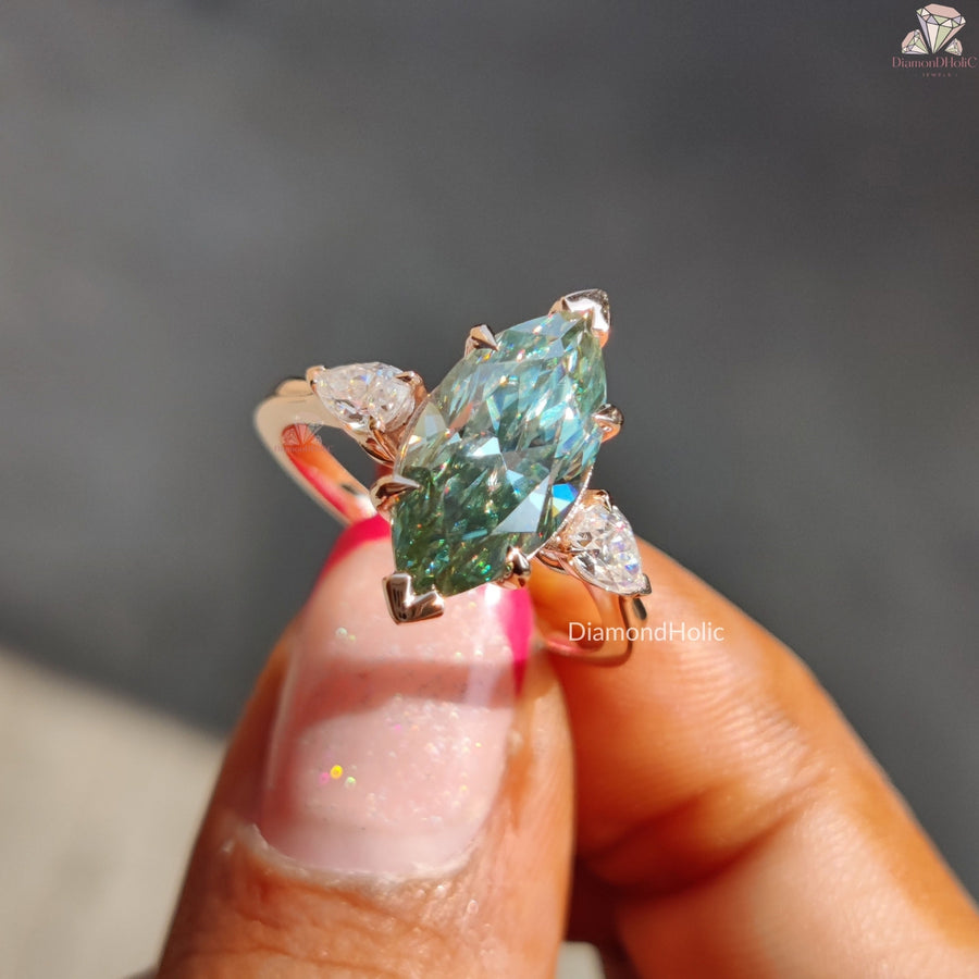 Cyan blue marquise moissanite three stone ring - marquise detail