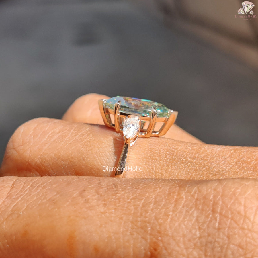 Cyan blue marquise moissanite three stone ring - sparkle view