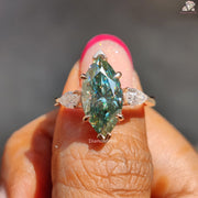 Cyan blue marquise moissanite three stone ring - three stone detail