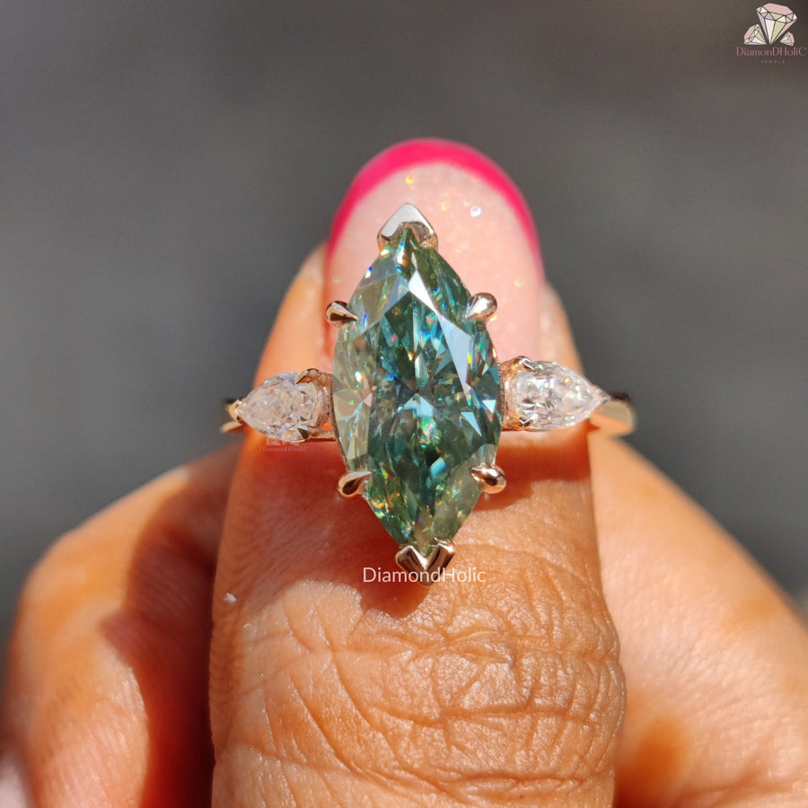 Cyan blue marquise moissanite three stone ring - three stone detail