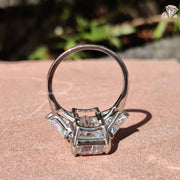 Symbol of Her Story | Triangle Diamond Side | Emerald Moissanite Ring

