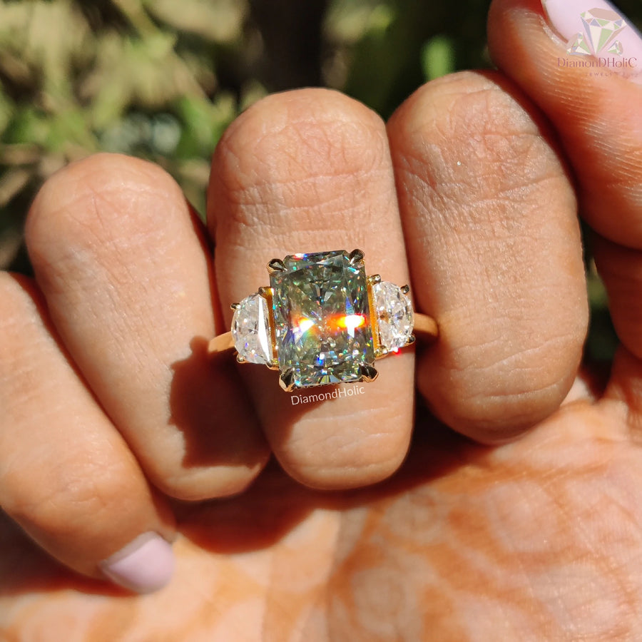 8.10 CT Radiant Cut Light Green Moissanite Three Stone Engagement Ring on finger by Diamond Holic