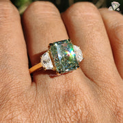 8.10 CT Radiant Cut Light Green Moissanite Three Stone Engagement Ring by Diamond Holic on hand reflection