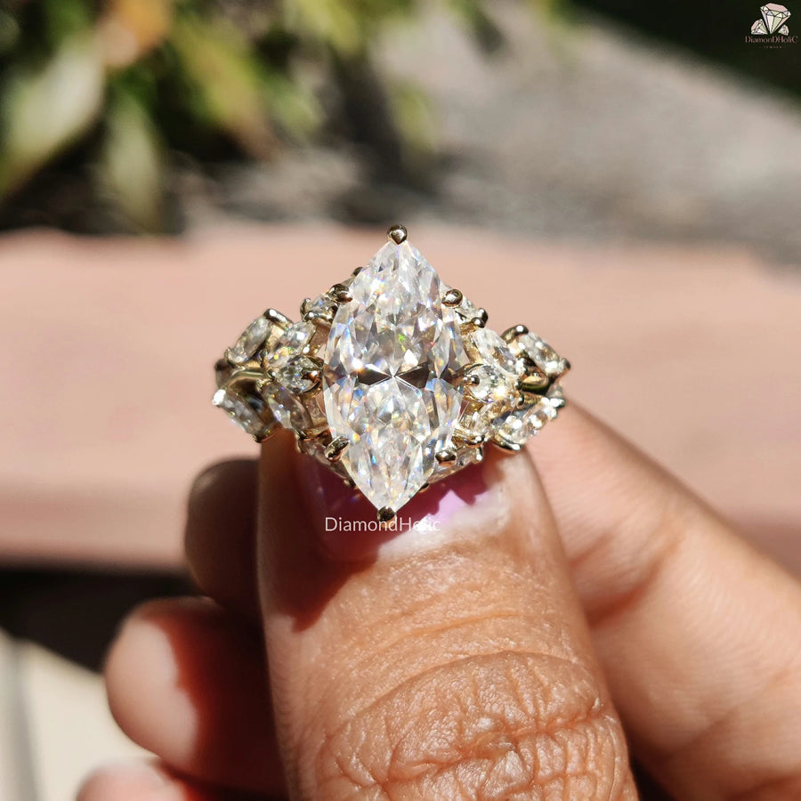 Diamond Holic ring featuring a sparkling Marquise Diamond centerpiece with intricate side stones