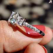 Diamond Holic princess cut moissanite ring with sparkling side stones on silver band