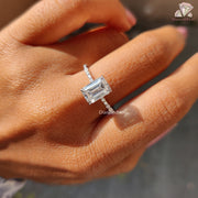 emerald cut moissanite ring with side stones