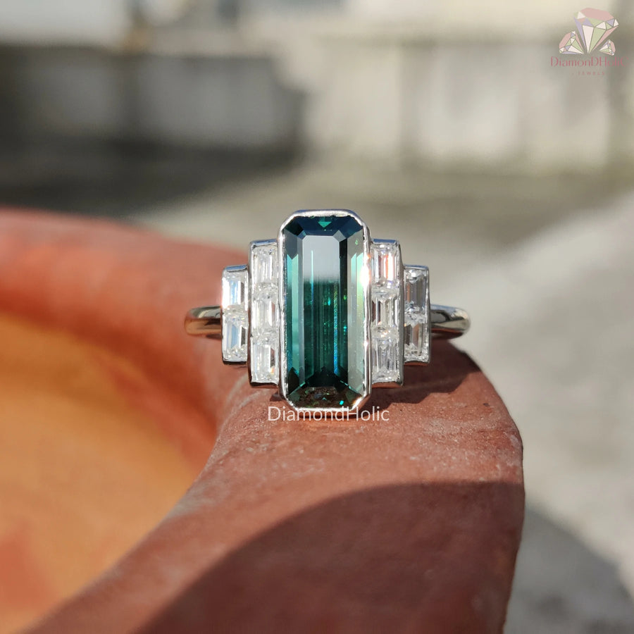 green moissanite rings with baguette diamonds