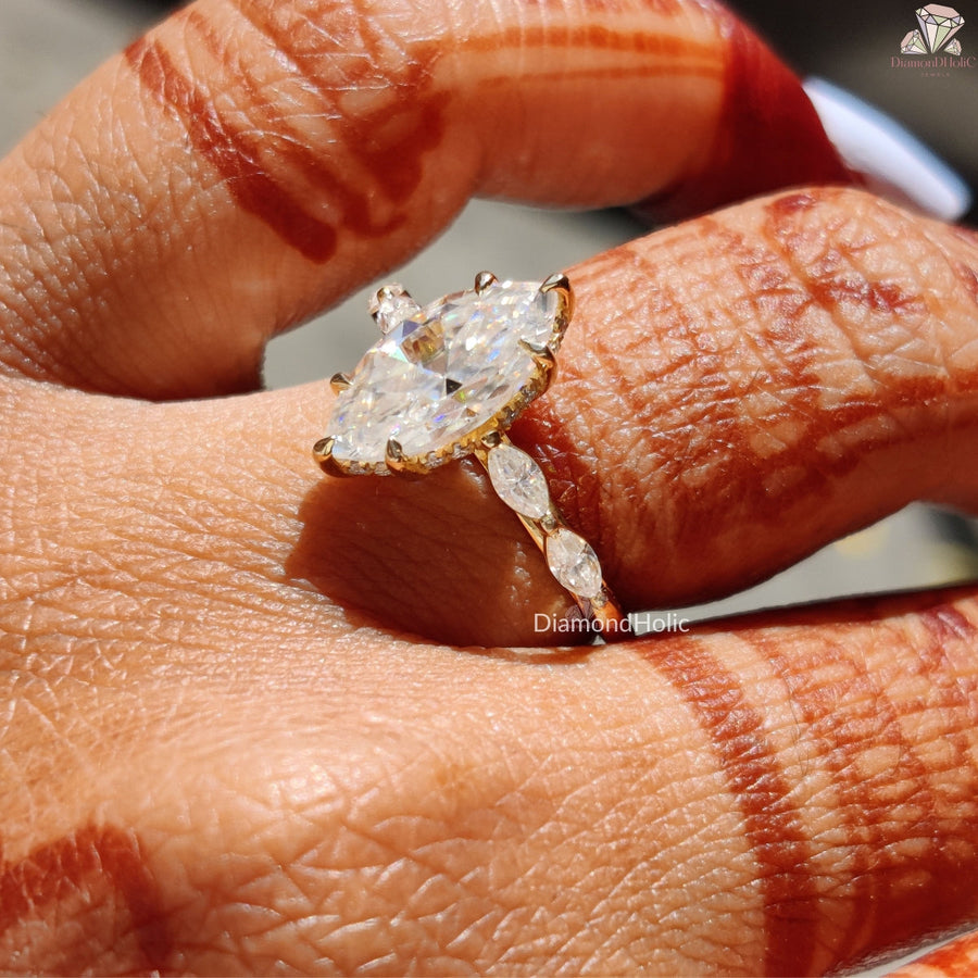 marquise halo engagement ring yellow gold