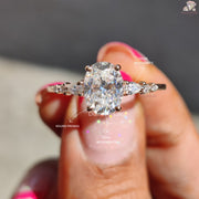 Oval cut moissanite engagement ring - three stone detail