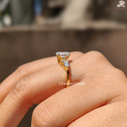 Oval lab grown diamond bridal ring - pear side stones detail