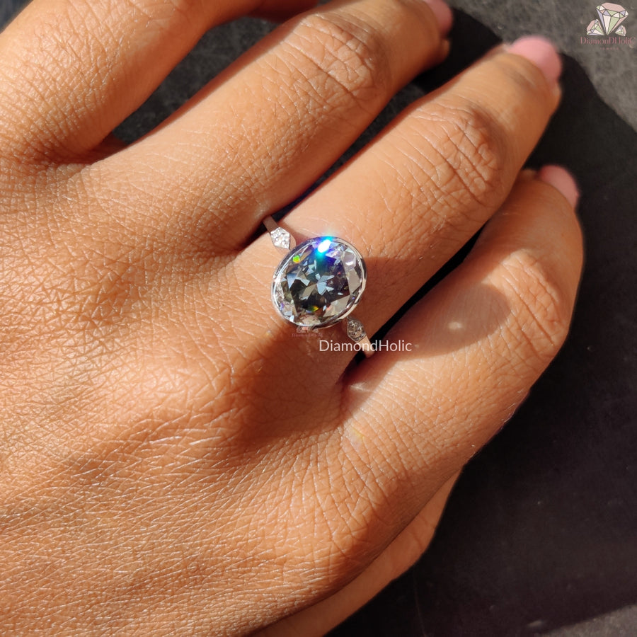 Oval moissanite bezel gray setting ring - close-up