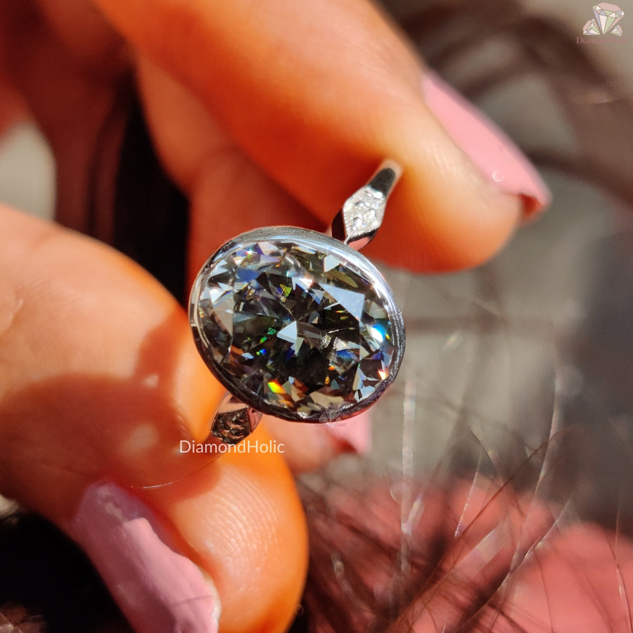 Oval moissanite bezel gray setting ring - lifestyle shot