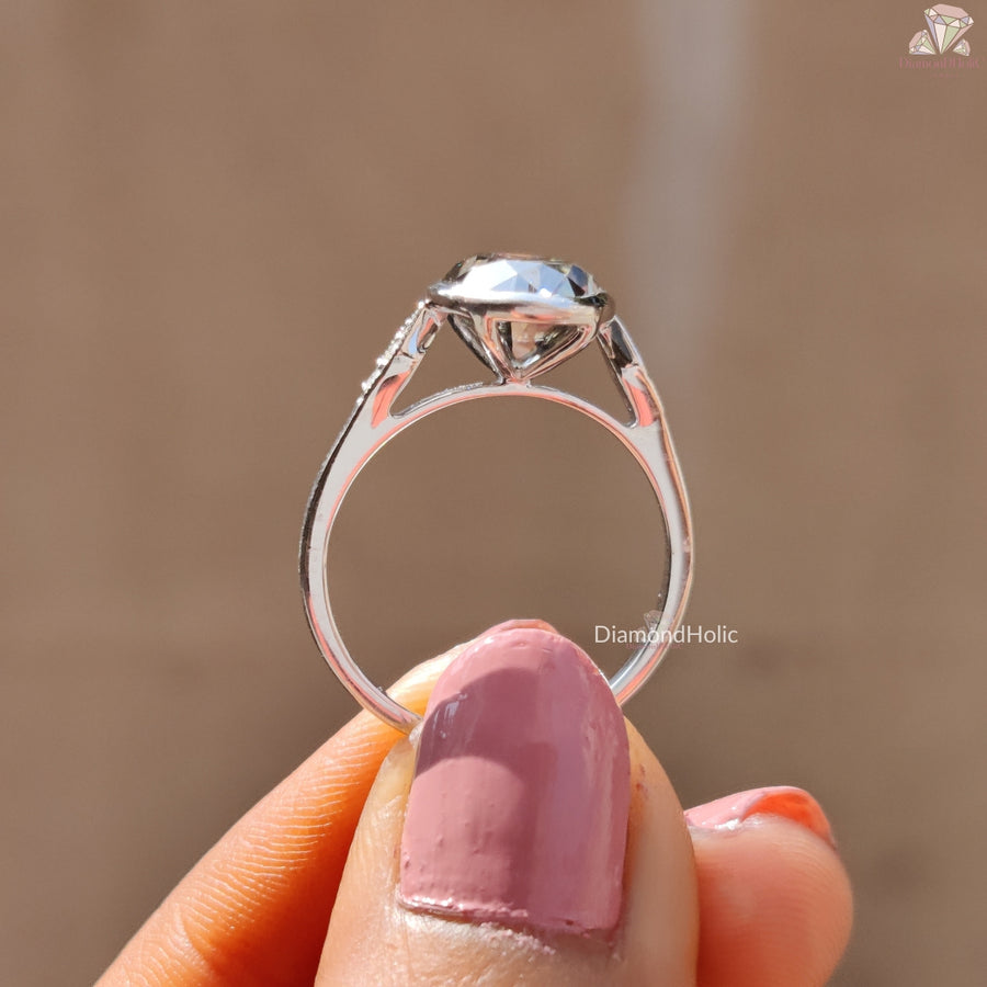 Oval moissanite bezel gray setting ring - top view