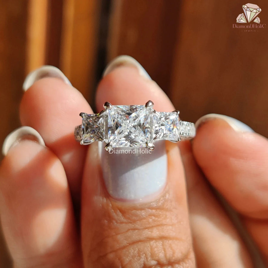 three stone moissanite engagement rings​