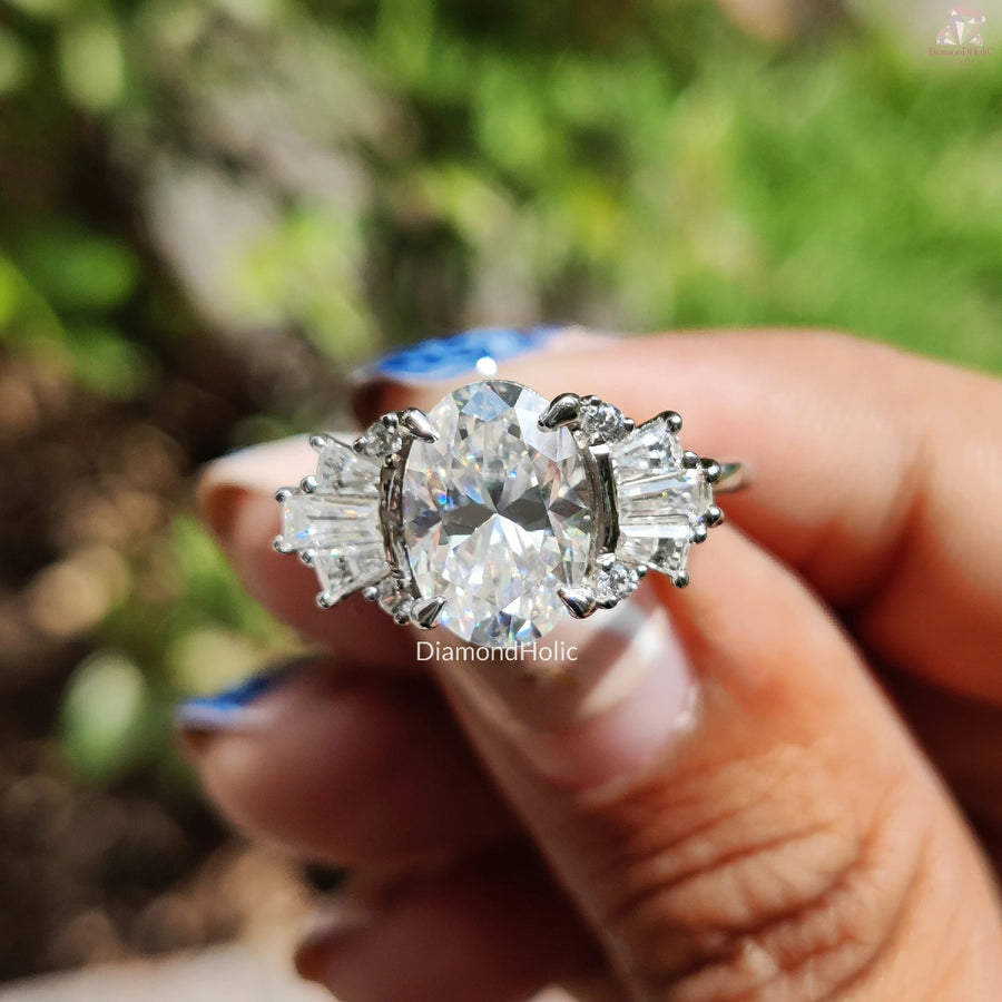 Luxe Moissanite Design | Side Stone Accent | Oval Centerpiece Ring

